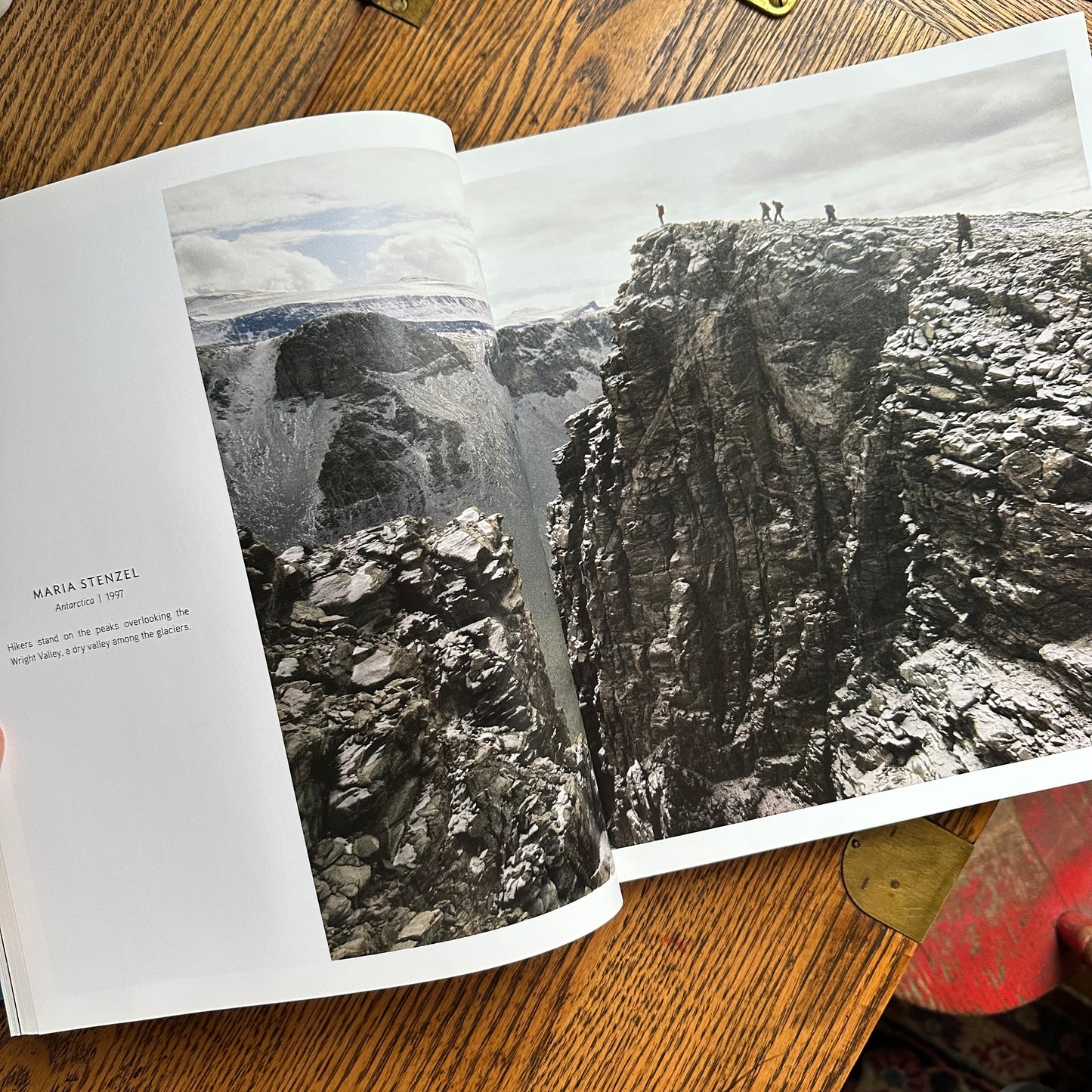 Stack of 6 Vintage NatGeo Coffee Table Books in Silver, White, and Black