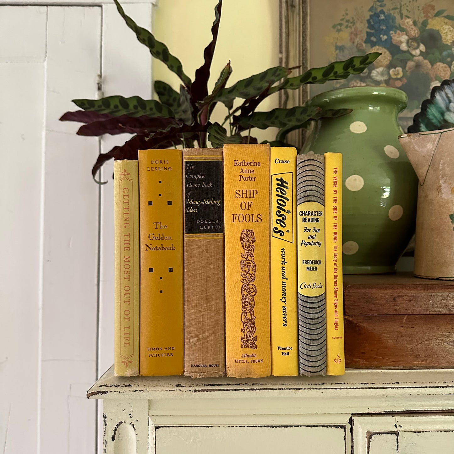 Stack of Seven Yellow Vintage Books with a Secret!